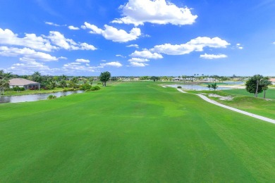 Enjoy refined Florida living in this impeccably maintained on Eagle Lakes Golf Club in Florida - for sale on GolfHomes.com, golf home, golf lot