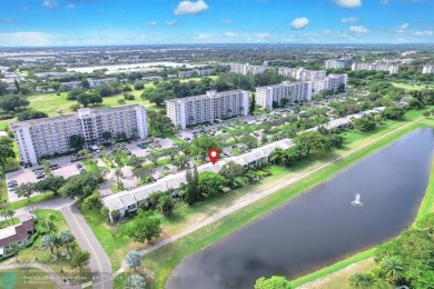 Experience modern elegance in this beautifully updated 2-bedroom on Palm-Aire Country Club and Resort - The Oaks in Florida - for sale on GolfHomes.com, golf home, golf lot