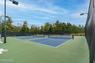 Discover this beautifully maintained 3- Bedroom, 3.5 bathroom on Cape Fear National At Brunswick Forest in North Carolina - for sale on GolfHomes.com, golf home, golf lot