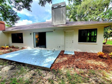 ** TOTAL REMODEL 2024!** Enjoy maintenance-free living with a on Tarpon Woods Golf Club in Florida - for sale on GolfHomes.com, golf home, golf lot