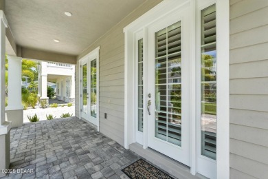 Welcome Home to luxury in this 2BD/2BA/2CG cottage home on an on Venetian Bay Golf Course in Florida - for sale on GolfHomes.com, golf home, golf lot