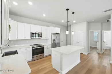 Welcome Home to luxury in this 2BD/2BA/2CG cottage home on an on Venetian Bay Golf Course in Florida - for sale on GolfHomes.com, golf home, golf lot