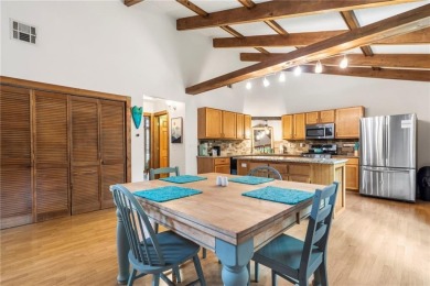 Tucked into the trees just minutes from Bentonville, this on Bella Vista - Metfield Golf Complex and Country Club in Arkansas - for sale on GolfHomes.com, golf home, golf lot