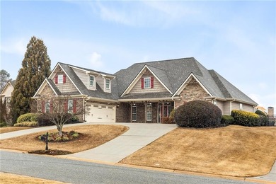 Discover elegance and comfort in this stunning home nestled in on Traditions of Braselton Golf Club in Georgia - for sale on GolfHomes.com, golf home, golf lot