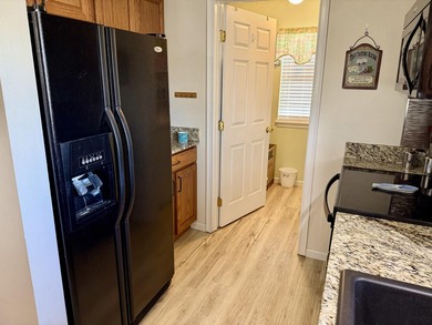 Welcome to this beautifully updated, fully furnished condo on Pointe Royale Village Country Club in Missouri - for sale on GolfHomes.com, golf home, golf lot