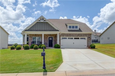 Located in the highly sought-after Traditions of Braselton, this on Traditions of Braselton Golf Club in Georgia - for sale on GolfHomes.com, golf home, golf lot
