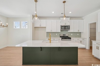 This popular Luca Plan is move in ready and just a short golf on Tidewater Golf Club and Plantation in South Carolina - for sale on GolfHomes.com, golf home, golf lot
