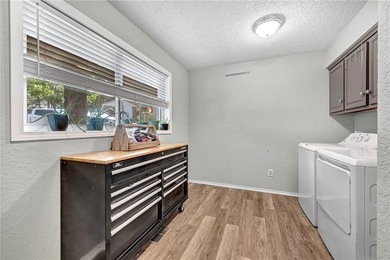 STUNNING END-UNIT TOWNHOME JUST MINUTES FROM LAKE WINDSOR, GOLF on Bella Vista Country Club - Berksdale in Arkansas - for sale on GolfHomes.com, golf home, golf lot