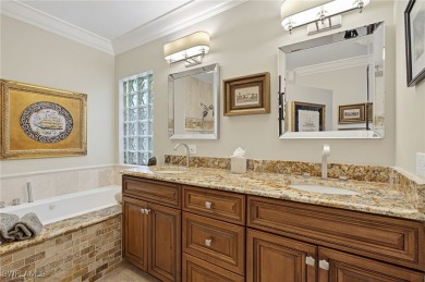 Experience luxury living at 12451 Gateway Greens Dr in Fort on Gateway Golf and Country Club in Florida - for sale on GolfHomes.com, golf home, golf lot