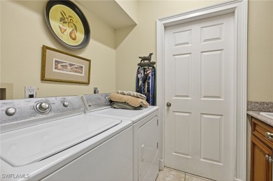 Experience luxury living at 12451 Gateway Greens Dr in Fort on Gateway Golf and Country Club in Florida - for sale on GolfHomes.com, golf home, golf lot
