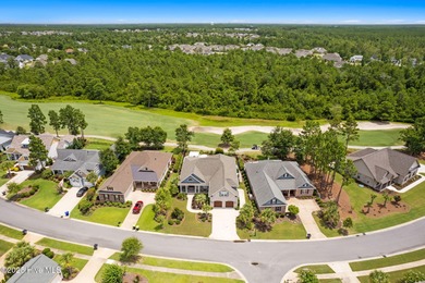 Welcome to this beautifully crafted stick-built home (not on Compass Pointe Golf Course in North Carolina - for sale on GolfHomes.com, golf home, golf lot