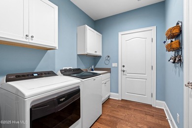 Welcome to this beautifully crafted stick-built home (not on Compass Pointe Golf Course in North Carolina - for sale on GolfHomes.com, golf home, golf lot