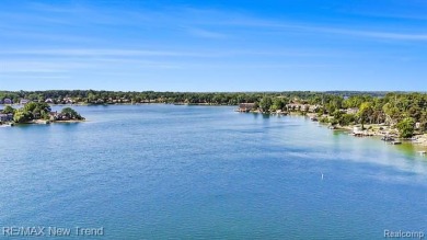 Shared Lake Frontage with Dock on All Sports Pine Lake!  This on Pine Lake Country Club in Michigan - for sale on GolfHomes.com, golf home, golf lot