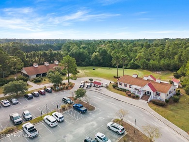 Expansive open views of Lions Paw #13 fairway and pond from this on Ocean Ridge Plantation in North Carolina - for sale on GolfHomes.com, golf home, golf lot