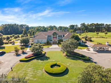Expansive open views of Lions Paw #13 fairway and pond from this on Ocean Ridge Plantation in North Carolina - for sale on GolfHomes.com, golf home, golf lot
