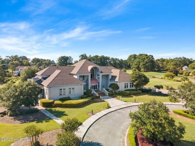Expansive open views of Lions Paw #13 fairway and pond from this on Ocean Ridge Plantation in North Carolina - for sale on GolfHomes.com, golf home, golf lot