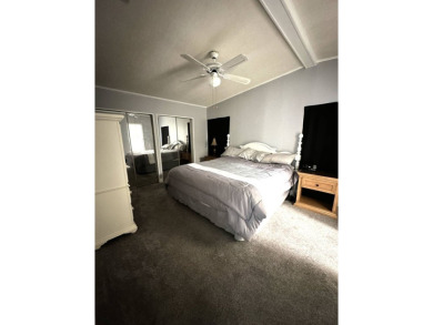 Your Tranquil Tree-Lined Retreat Awaits: Stunning Turn-Key on Grasslands Golf and Country Club in Florida - for sale on GolfHomes.com, golf home, golf lot