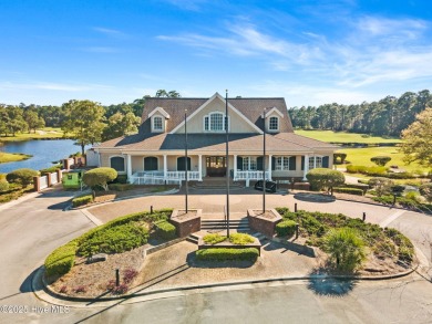 Expansive open views of Lions Paw #13 fairway and pond from this on Ocean Ridge Plantation in North Carolina - for sale on GolfHomes.com, golf home, golf lot
