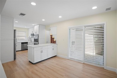 Fully renovated 2-bedroom, 2-bath home plus office/den located on The Club at Emerald Hills in Florida - for sale on GolfHomes.com, golf home, golf lot