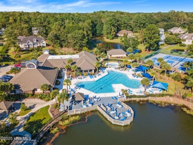 Expansive open views of Lions Paw #13 fairway and pond from this on Ocean Ridge Plantation in North Carolina - for sale on GolfHomes.com, golf home, golf lot