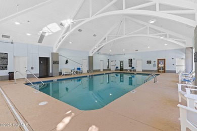 Expansive open views of Lions Paw #13 fairway and pond from this on Ocean Ridge Plantation in North Carolina - for sale on GolfHomes.com, golf home, golf lot