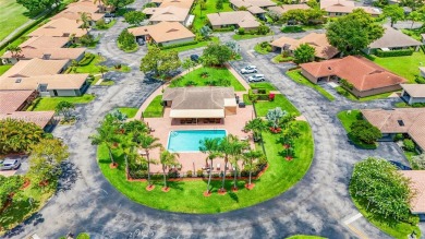 Fully renovated 2-bedroom, 2-bath home plus office/den located on The Club at Emerald Hills in Florida - for sale on GolfHomes.com, golf home, golf lot