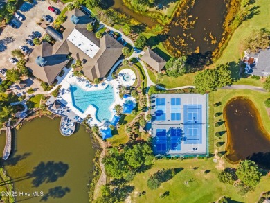 Expansive open views of Lions Paw #13 fairway and pond from this on Ocean Ridge Plantation in North Carolina - for sale on GolfHomes.com, golf home, golf lot