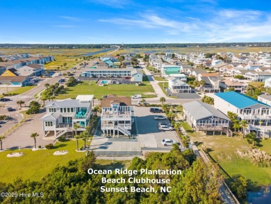 Expansive open views of Lions Paw #13 fairway and pond from this on Ocean Ridge Plantation in North Carolina - for sale on GolfHomes.com, golf home, golf lot