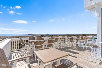 Expansive open views of Lions Paw #13 fairway and pond from this on Ocean Ridge Plantation in North Carolina - for sale on GolfHomes.com, golf home, golf lot