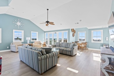 Expansive open views of Lions Paw #13 fairway and pond from this on Ocean Ridge Plantation in North Carolina - for sale on GolfHomes.com, golf home, golf lot