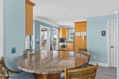 Expansive open views of Lions Paw #13 fairway and pond from this on Ocean Ridge Plantation in North Carolina - for sale on GolfHomes.com, golf home, golf lot