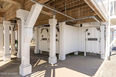 Expansive open views of Lions Paw #13 fairway and pond from this on Ocean Ridge Plantation in North Carolina - for sale on GolfHomes.com, golf home, golf lot