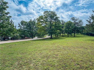 A rare chance at a single parcel totaling 1.01 acres in Holiday on Holiday Island Executive Golf Course in Arkansas - for sale on GolfHomes.com, golf home, golf lot
