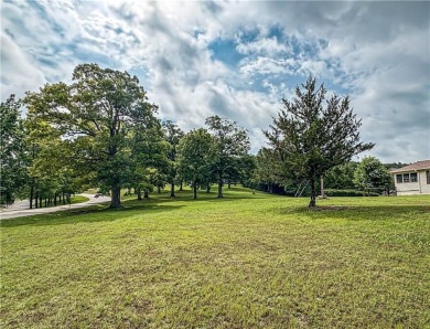A rare chance at a single parcel totaling 1.01 acres in Holiday on Holiday Island Executive Golf Course in Arkansas - for sale on GolfHomes.com, golf home, golf lot