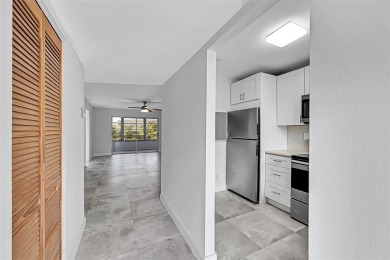 55+ COMMUNITY, THIS TURN KEY READY CORNER UNIT IS ON THE 3Rd on Sunrise Lakes Phase III in Florida - for sale on GolfHomes.com, golf home, golf lot