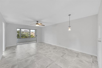 55+ COMMUNITY, THIS TURN KEY READY CORNER UNIT IS ON THE 3Rd on Sunrise Lakes Phase III in Florida - for sale on GolfHomes.com, golf home, golf lot