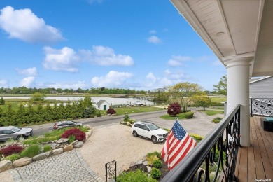 This magnificent waterfront residence underwent a complete on Woodmere Club, Inc. in New York - for sale on GolfHomes.com, golf home, golf lot