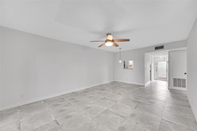 55+ COMMUNITY, THIS TURN KEY READY CORNER UNIT IS ON THE 3Rd on Sunrise Lakes Phase III in Florida - for sale on GolfHomes.com, golf home, golf lot