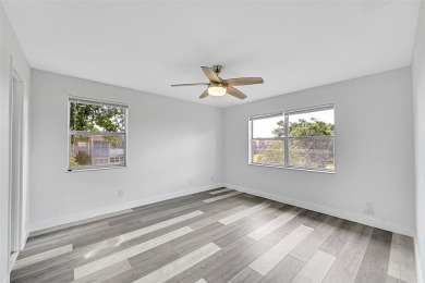 55+ COMMUNITY, THIS TURN KEY READY CORNER UNIT IS ON THE 3Rd on Sunrise Lakes Phase III in Florida - for sale on GolfHomes.com, golf home, golf lot