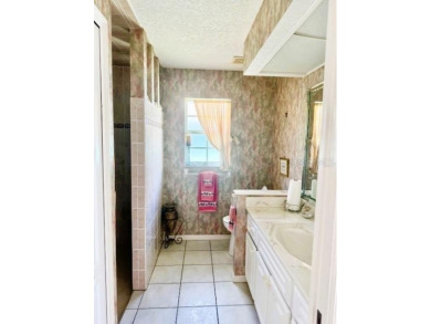 *For Sale: Stunning 1996-Built 3-Bedroom, 2-Bath Lakefront Home on Pinemoor West Golf Club in Florida - for sale on GolfHomes.com, golf home, golf lot