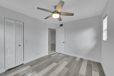 55+ COMMUNITY, THIS TURN KEY READY CORNER UNIT IS ON THE 3Rd on Sunrise Lakes Phase III in Florida - for sale on GolfHomes.com, golf home, golf lot