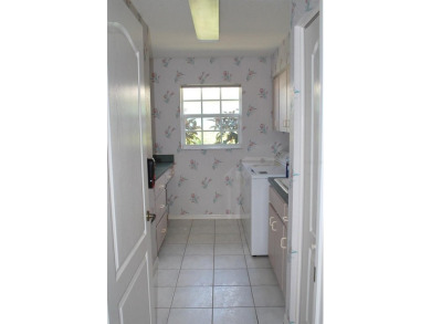 *For Sale: Stunning 1996-Built 3-Bedroom, 2-Bath Lakefront Home on Pinemoor West Golf Club in Florida - for sale on GolfHomes.com, golf home, golf lot