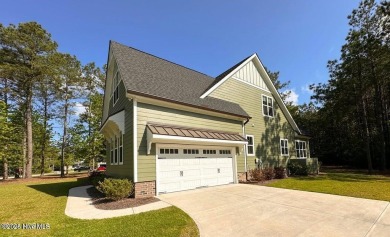 Well maintained  home in the premier gated community RiverSea on Carolina National Golf Club in North Carolina - for sale on GolfHomes.com, golf home, golf lot