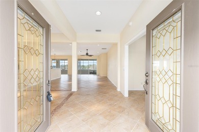 This distinguished Johnstown model features remarkable sunsets on Eagle Ridge At Spruce Creek Country Club in Florida - for sale on GolfHomes.com, golf home, golf lot