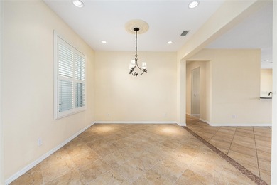 This distinguished Johnstown model features remarkable sunsets on Eagle Ridge At Spruce Creek Country Club in Florida - for sale on GolfHomes.com, golf home, golf lot