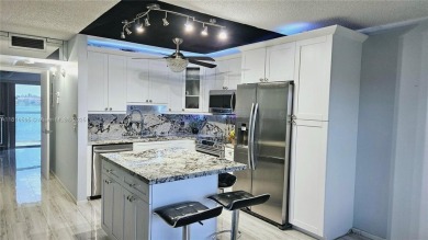 $2K Monthly Income Producing Apartment w. Exc Waterfront Living on Flamingo Lakes Country Club in Florida - for sale on GolfHomes.com, golf home, golf lot