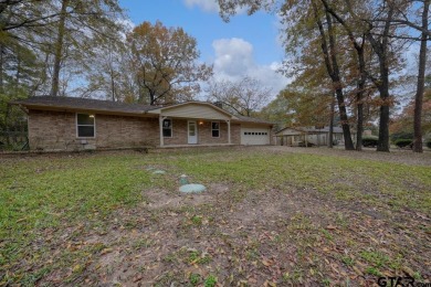 This lovely single-story home combines comfort, style, and on Hide-A-Way Lake Golf Course in Texas - for sale on GolfHomes.com, golf home, golf lot