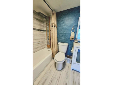 $2K Monthly Income Producing Apartment w. Exc Waterfront Living on Flamingo Lakes Country Club in Florida - for sale on GolfHomes.com, golf home, golf lot