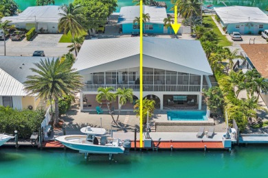This well-maintained 2 Bedroom, 2 Bath elevated canal front half on Key Colony Beach Golf Course in Florida - for sale on GolfHomes.com, golf home, golf lot