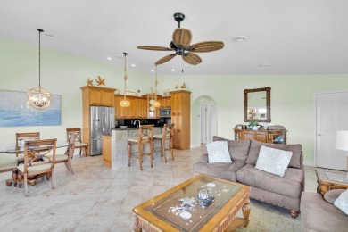 This well-maintained 2 Bedroom, 2 Bath elevated canal front half on Key Colony Beach Golf Course in Florida - for sale on GolfHomes.com, golf home, golf lot